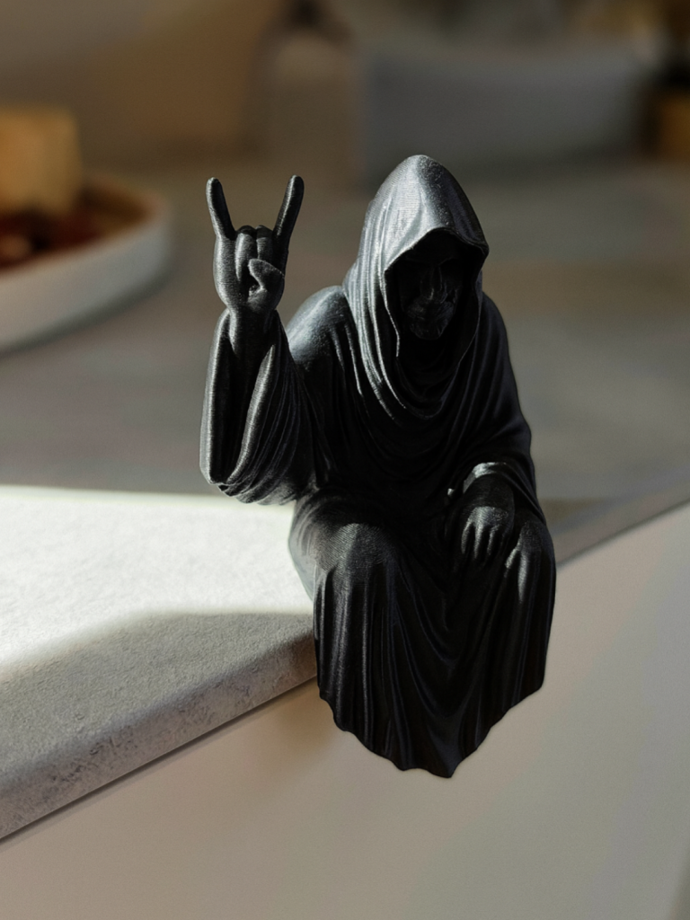 The Grim Reaper Sitting